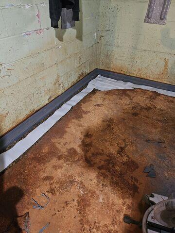 During: Our Foreman, Juan, and his crew successfully secured all the products in the basement.