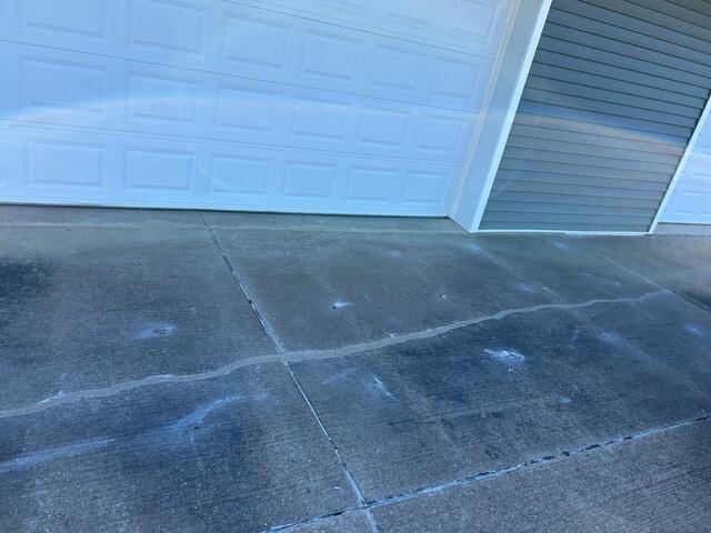 During: Our Foreman, Patrick, and his crew successfully installed PolyLevel and NexusPro on the damaged concrete.