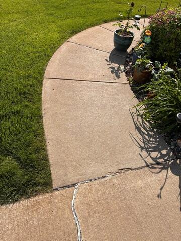 Before: The Design Specialist recommended repairing the damaged concrete with PolyLevel.