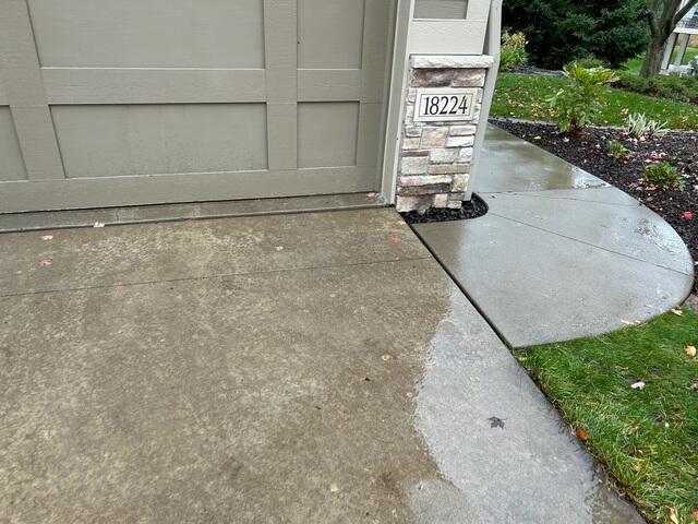 During: Our Foreman, Patrick, and his crew inserted PolyLevel below the sinking walkway and driveway.