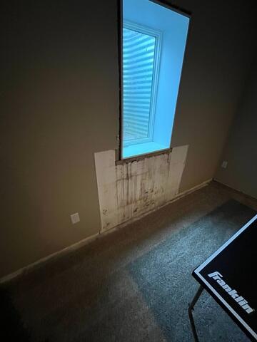 Before: Our Design Specialist, Ian, recommended waterproofing the leaking basement to prevent further damage.