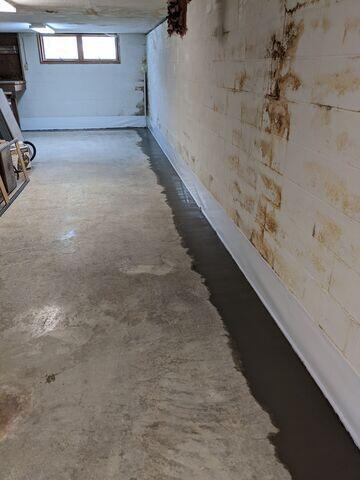 During: Our Foreman, Lane, and his crew successfully secured all the products in the basement.