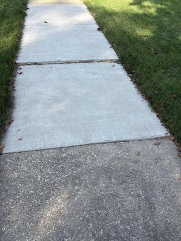 During: Our Foreman, Patrick, and his crew successfully lifted the slabs back into place.