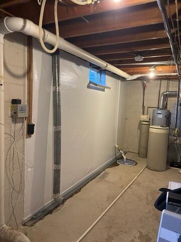 During: Our Foreman, Diego, and his crew successfully secured the waterproofing products throughout the basement.