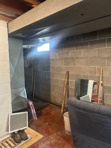 Before: Dylan, one of our Design Specialists, recommended securing GeoLock Wall Anchors on the cracked and damaged walls.