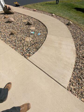 Before: Kyle, one of our Design Specialists, recommended lifting the walkway back to its original level.