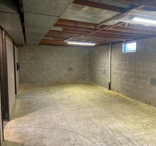 Before: Our Design Specialist, Tony, decided to take a closer look at the water-stained walls.