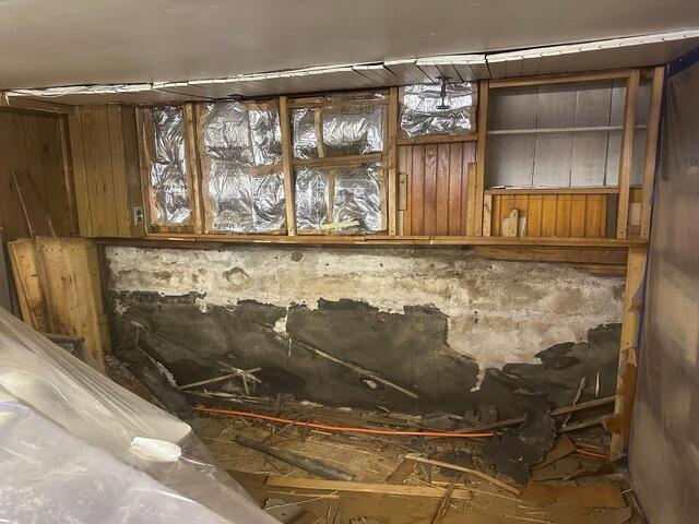 The once damp and outdated basement space.