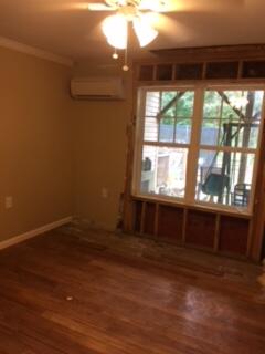 Damaged siding left the property susceptible to a leak, which warped the hardwood floor.