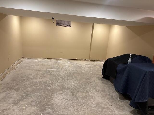 Before: Our Design Specialist recommended securing several waterproofing products throughout the basement.