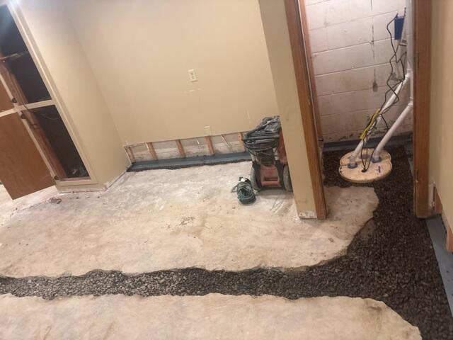 During: Our Foreman, Jesus, and his crew worked hard to secure the waterproofing products throughout the basement.