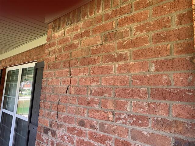 Structural damage and stucco restoration in Bethlehem, Georgia.