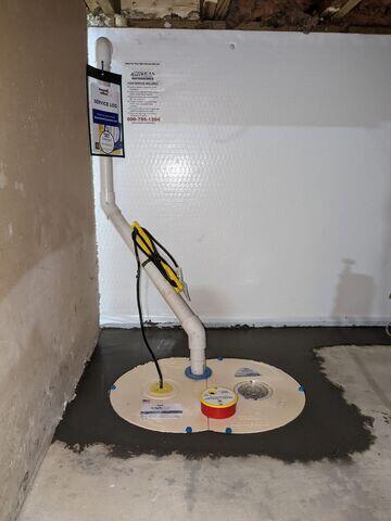 During: Our Foreman, Lane, and his crew secured the waterproofing products throughout the basement.