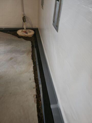 During: Our Foreman, Arturo, and his crew worked hard to secure all the products in the basement.