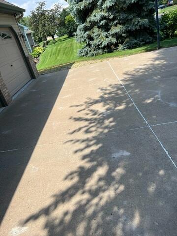 During: Our Foreman, Dylon, and his crew successfully lifted and leveled the sidewalk back into place.