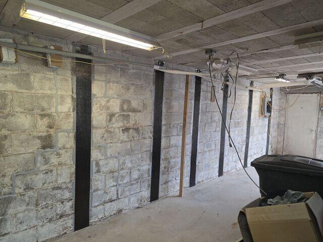 CarbonArmor carbon fiber reinforcement straps installed along the garage's block foundation walls in Collegeville, PA help stabilize bowing masonry and prevent further inward movement. Bonded with structural epoxy, these ultra-strong carbon fiber straps reinforce the wall while maintaining a low-profile appearance.