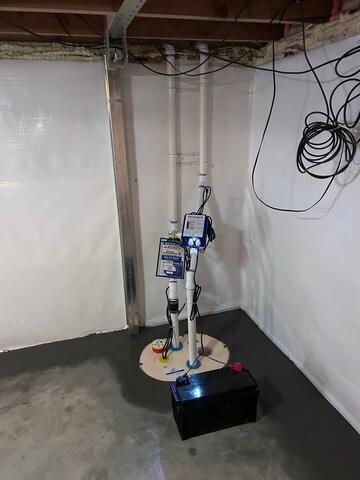 To address the water issue, we installed a full interior perimeter drainage system designed to capture water at the point of entry and direct it to a high-performance sump pump system for safe discharge away from the home. To improve the condition of the basement walls and help manage any moisture coming through them, we installed the CleanSpace wall system. This durable liner helps channel wall moisture into the drainage system while creating a cleaner, brighter appearance throughout the space.