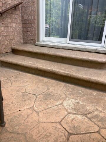 At the back of the home, the patio steps had dropped, creating a large, hazardous gap beneath the sliding door threshold. This made access difficult and left the door frame unsupported until the area was stabilized.