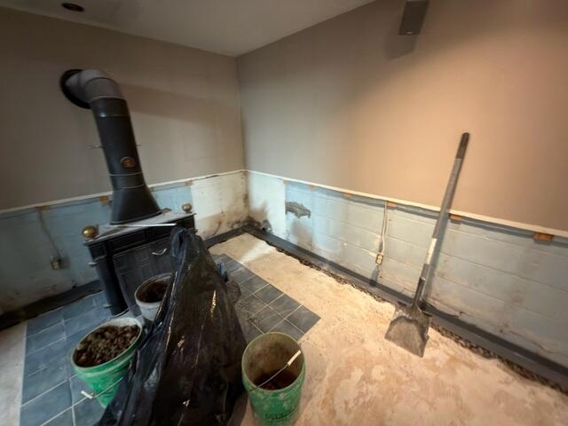 The crew installed WaterGuard around the entire basement perimeter in both the finished and unfinished parts of the basement.