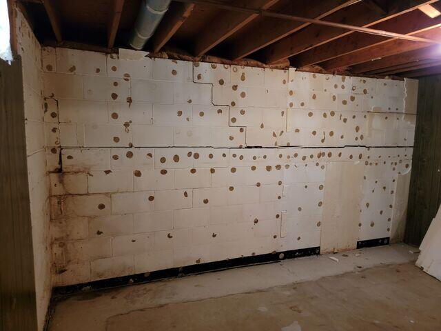 Before: Darin, one of our Design Specialists, recommended securing CarbonArmor on the damaged foundation wall.