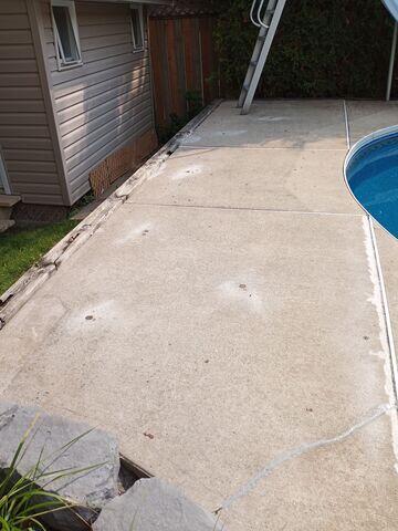 Problem solved. After injecting our high-density polyurethane foam, the slabs are level with the back wooden beam and porch, closing the settlement crack and restoring a safe, even surface for walking and entertaining.