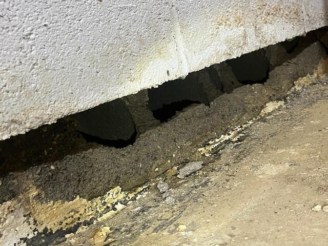 This photo is the reason why we think other contractors wouldn't touch this project. Jackhammering the floor near this wall could result in major liability.