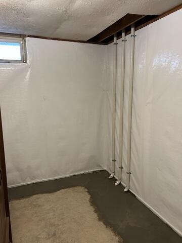 Discharge pipes are quite discreet, especially for how important they are! The Sump Pump pushes all the water out these PVC pipes.