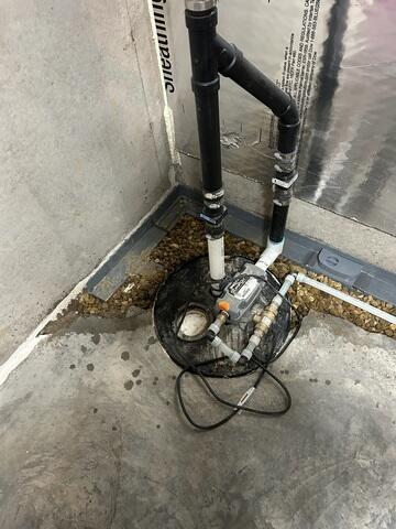 During: Our Foreman, Jesus, and his crew started by securing WaterGuard along the basement perimeter.