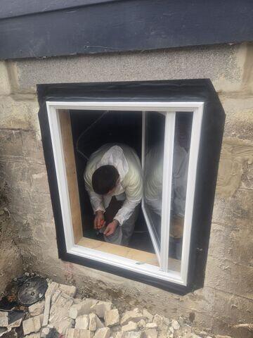 Up-close look at our crew putting the finishing touches on the window trim.