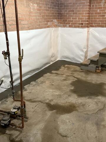 To properly manage the water intrusion, a comprehensive interior waterproofing system was installed, including:

WaterGuard® perimeter drainage system
TripleSafe® sump pump system
CleanSpace® wall system to manage wall moisture