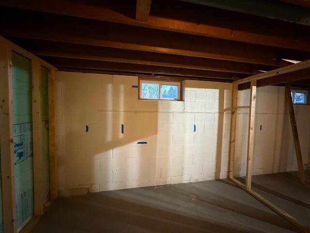 Before: Our Design Specialist, Romeo, recommended securing GeoLock Wall Anchors on the damaged wall.