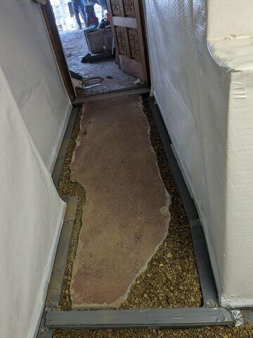 During: Our Foreman, Arturo, and his crew secured all the products in the basement.