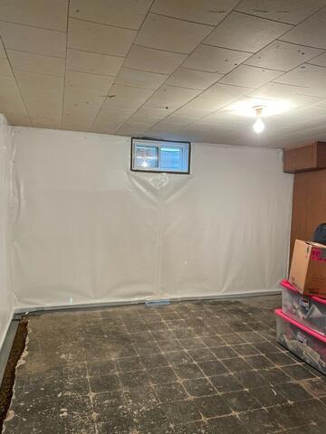 During: Our Foreman, Gabriel, and his crew successfully secured all the waterproofing products in the basement.