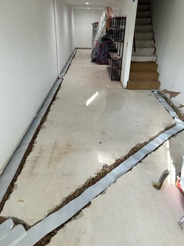 During: Our Foreman, Matt, and his crew worked hard to secure all the waterproofing products in the basement.