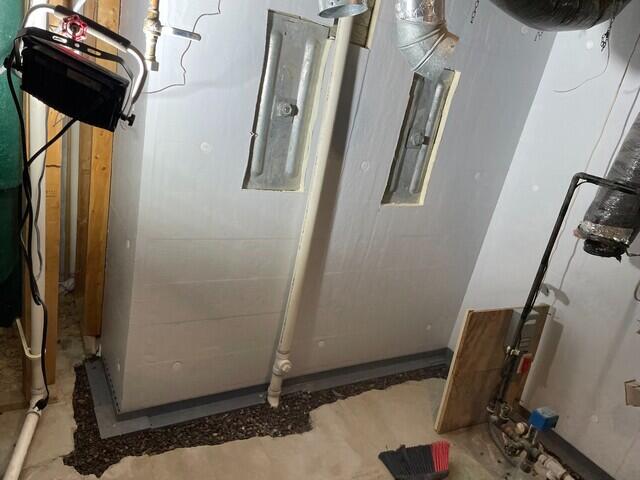 During: Our Foreman, Jesus, and his crew traveled and secured all the products in the basement.