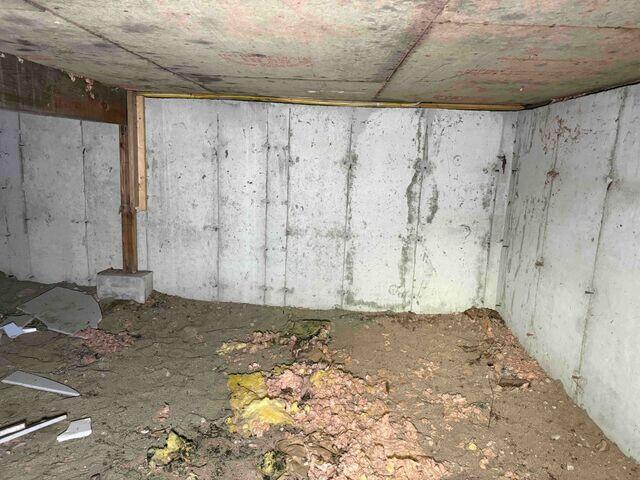 This Coventry, Vermont, crawl space needed a new support system and vapor barrier to prevent future damage to the home.