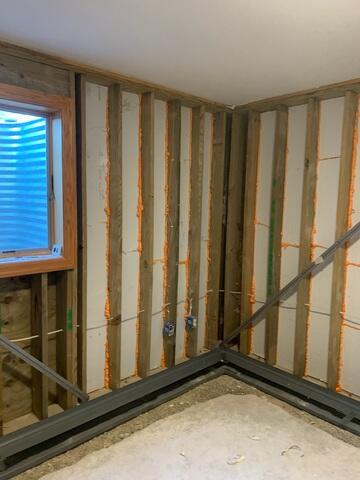 During: Our Foreman, Roel, and his crew worked hard to secure all the products in the basement.