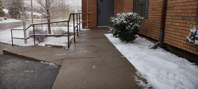 Settled concrete at these double doors created an uneven gap and a major liability for the property owner. In just a few hours, we stabilized the area and brought the steps back to their original height without any messy excavation.