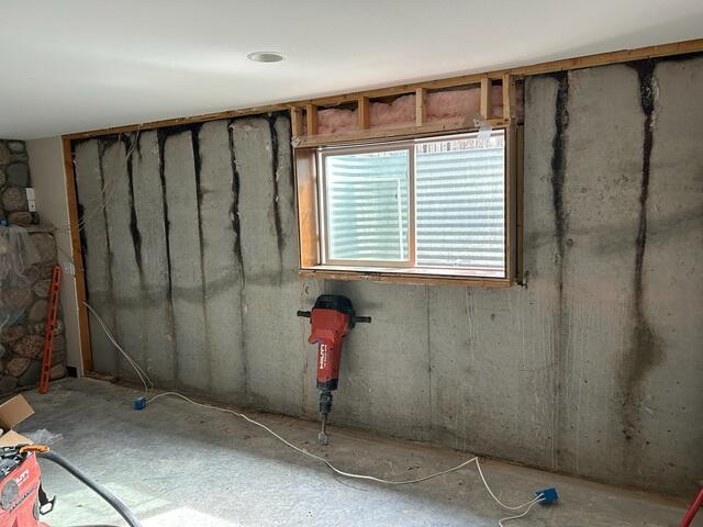 Before: Ryan, one of our Design Specialists, recommended waterproofing the entire basement.