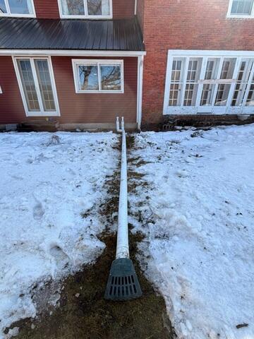 LawnScape™ outlet to direct water safely away from the home in East Hardwick, Vermont.