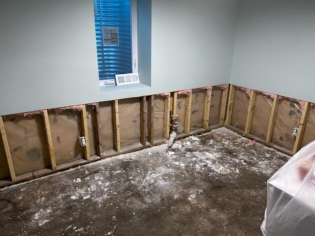 Before: Our Design Specialist, Ryan, suggested securing several waterproofing products throughout the basement.