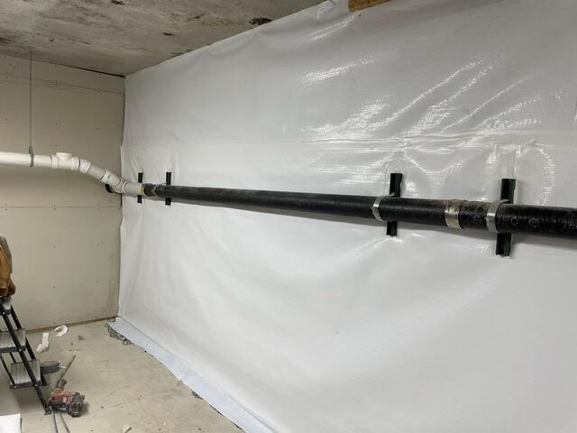 During: Our crew worked hard to secure all the products in the basement.