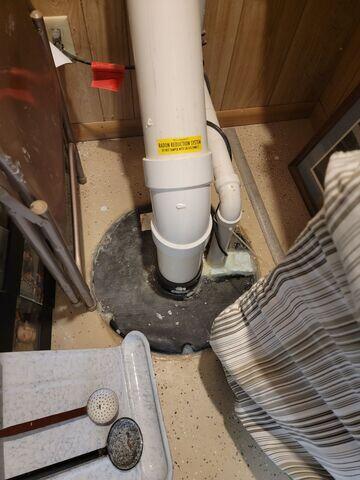 The sump pump system before our crew replaced it