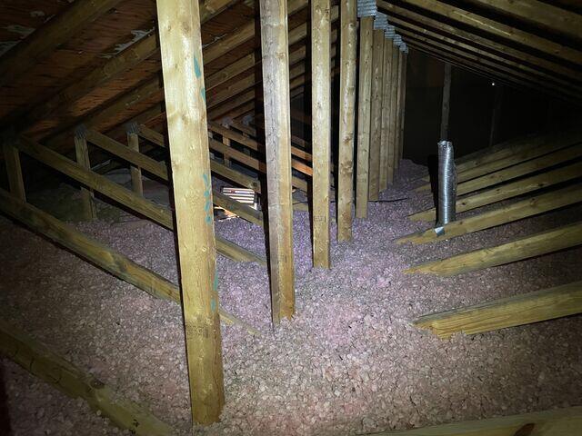 The bath fan exhaust routed directly into the attic