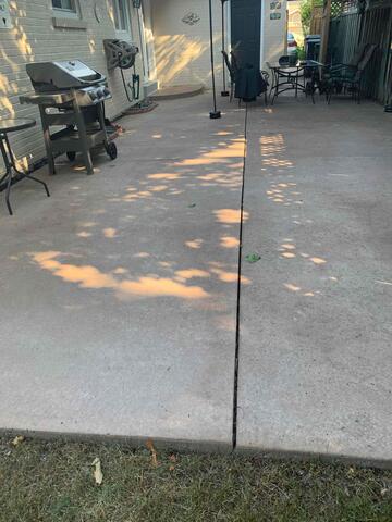 This wide-angle view of the Etobicoke patio highlights the significant separation occurring at the expansion joints. The uneven slabs not only disrupted the visual flow of the outdoor living space but also created a series of hazardous transitions across the entire surface area.