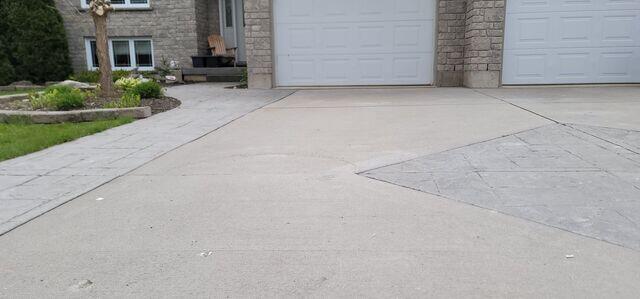 A wide view showing the entire driveway. It demonstrates the scale of the job and how we saved all that concrete without the need for a messy replacement.