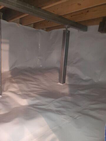 Encapsulating the crawl space seals out moisture, dirt, and pests! The crew also installed SmartJacks in the crawl space to stabilize and lift the floors above back toward their original position.