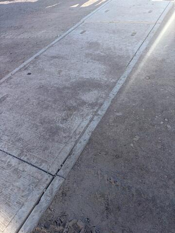 Concrete panels were successfully re-leveled, restoring proper alignment and support.