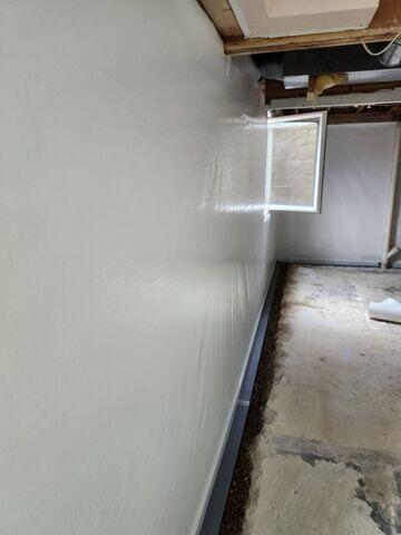 During: Our Foreman, Arturo, and his crew secured several basement waterproofing products throughout the basement.