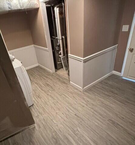 Our EverLast Wall Restoration was installed on the bottom half of the basement wall in this photo, giving it a finished look while working seamlessly with the flooring.